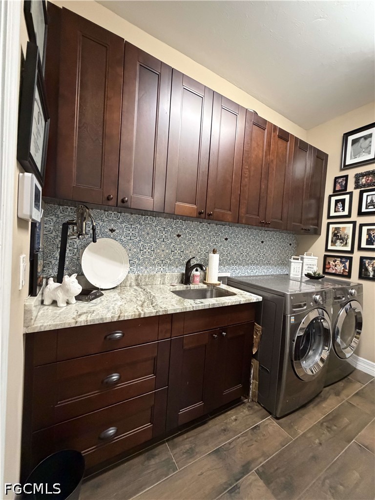 190 2nd Street Southeast Naples, FL 34117 - Photo 36 of 47 a bathroom with a granite countertop double vanity sink and a mirror