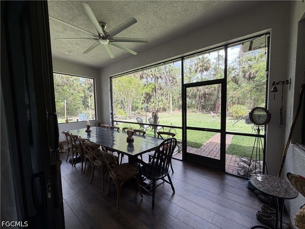 190 2nd Street Southeast Naples, FL 34117 - Photo 38 of 47 a view of a dining room with furniture window and wooden floor