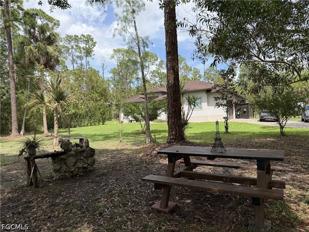 190 2nd Street Southeast Naples, FL 34117 - Photo 46 of 47 a view of a park with large trees