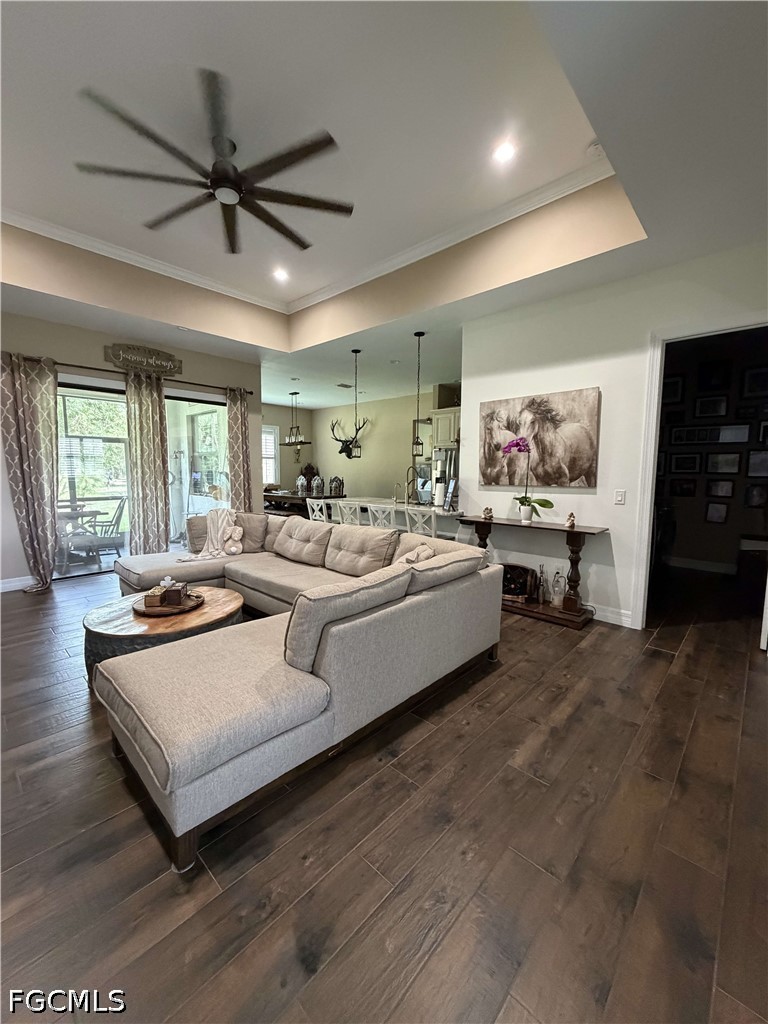 190 2nd Street Southeast Naples, FL 34117 - Photo 7 of 47 a living room with furniture and a large window