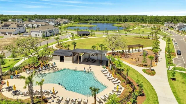 a view of a swimming pool with a lake view