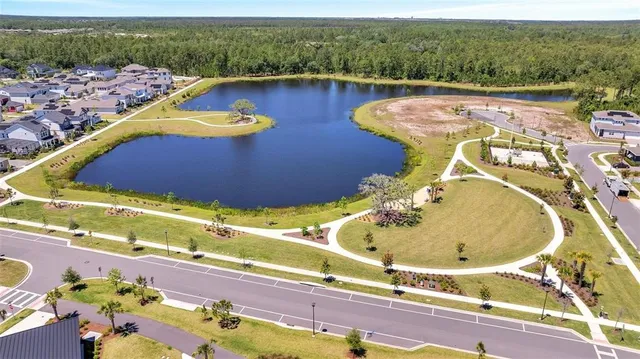 a view of a swimming pool with a lake view