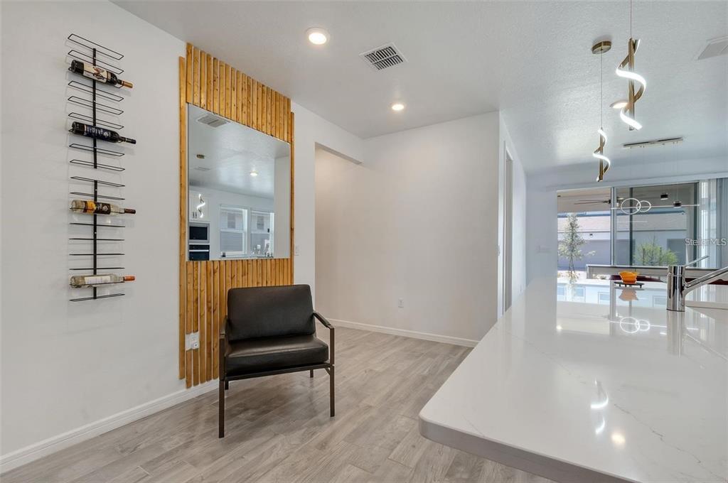 6494 Rover Way St. Cloud, FL 34771 - Photo 6 of 50 a living room with furniture and a table