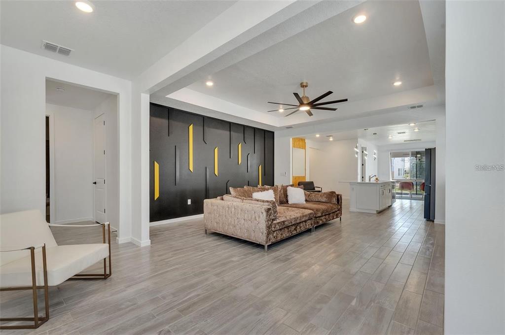 6494 Rover Way St. Cloud, FL 34771 - Photo 7 of 50 a living room with furniture and a wooden floor