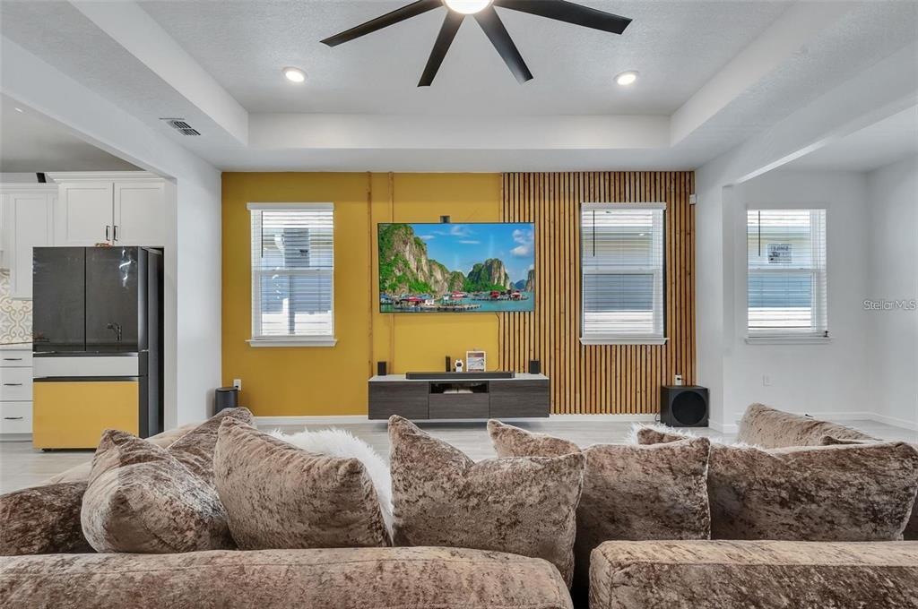 6494 Rover Way St. Cloud, FL 34771 - Photo 8 of 50 a bedroom with a bed and wooden floor