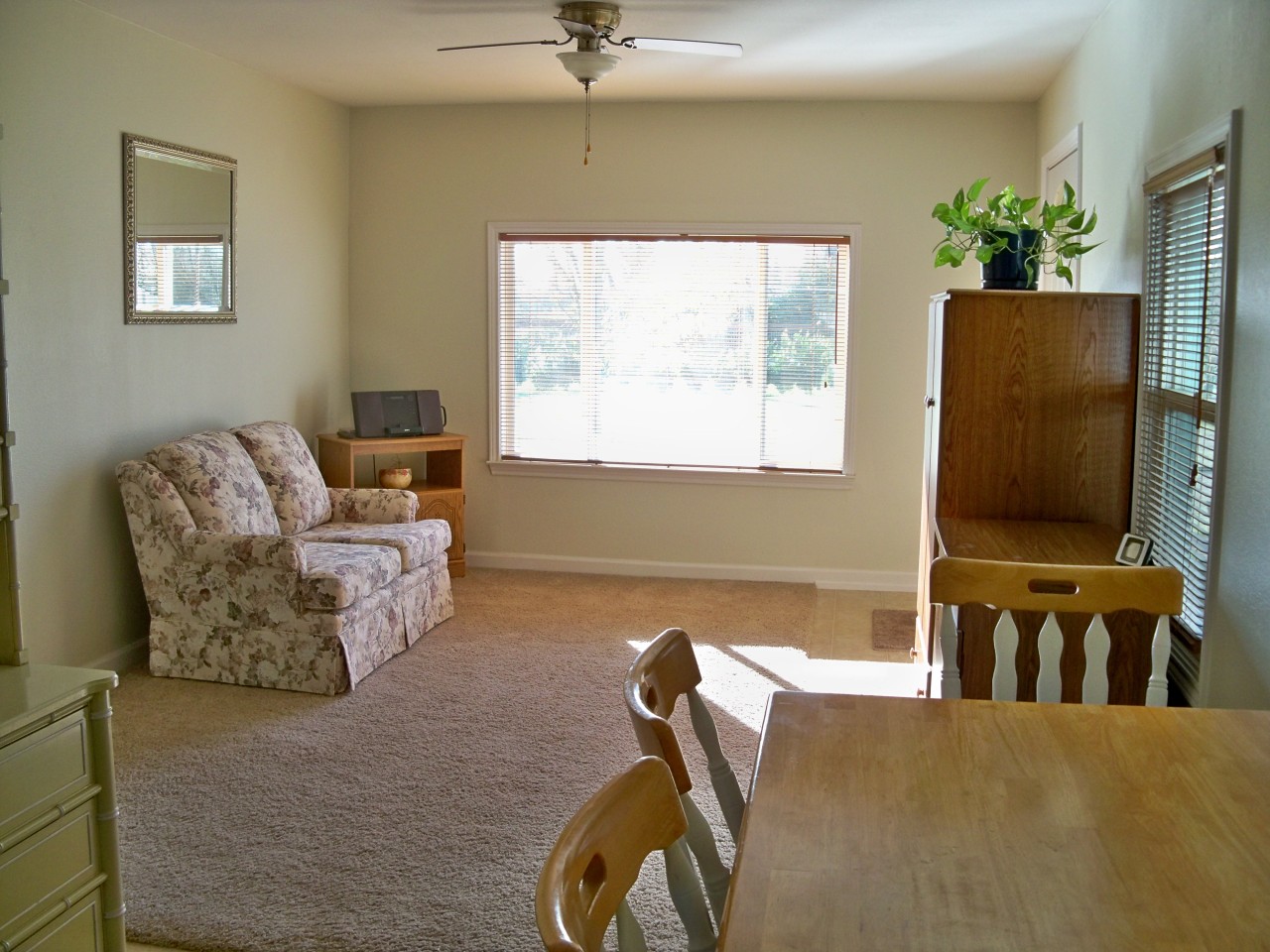 21932 Lone Tree Road Anderson, CA 96007 - Photo 3 of 26 a living room with furniture and a flat screen tv
