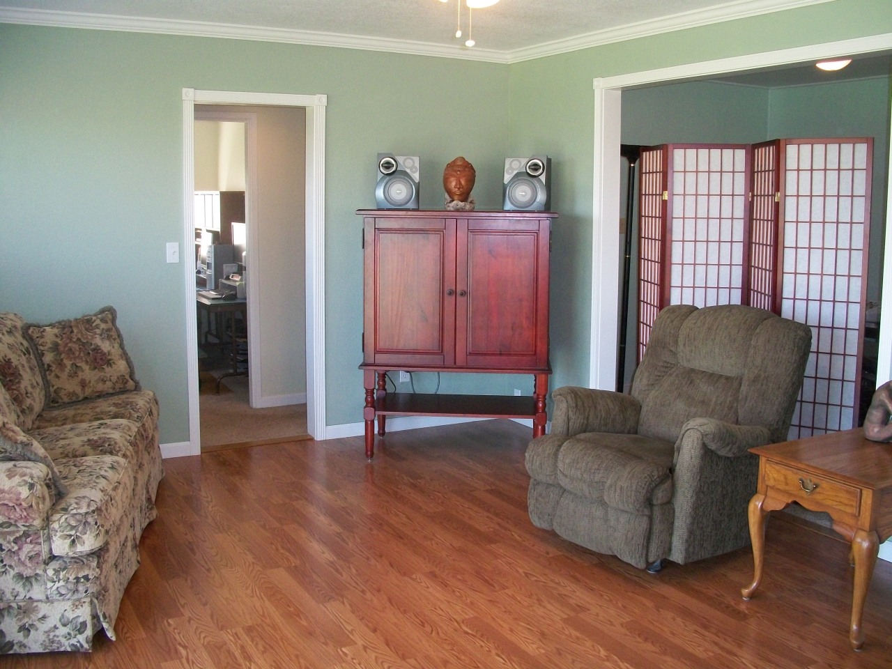 21932 Lone Tree Road Anderson, CA 96007 - Photo 10 of 26 a living room with furniture and a window