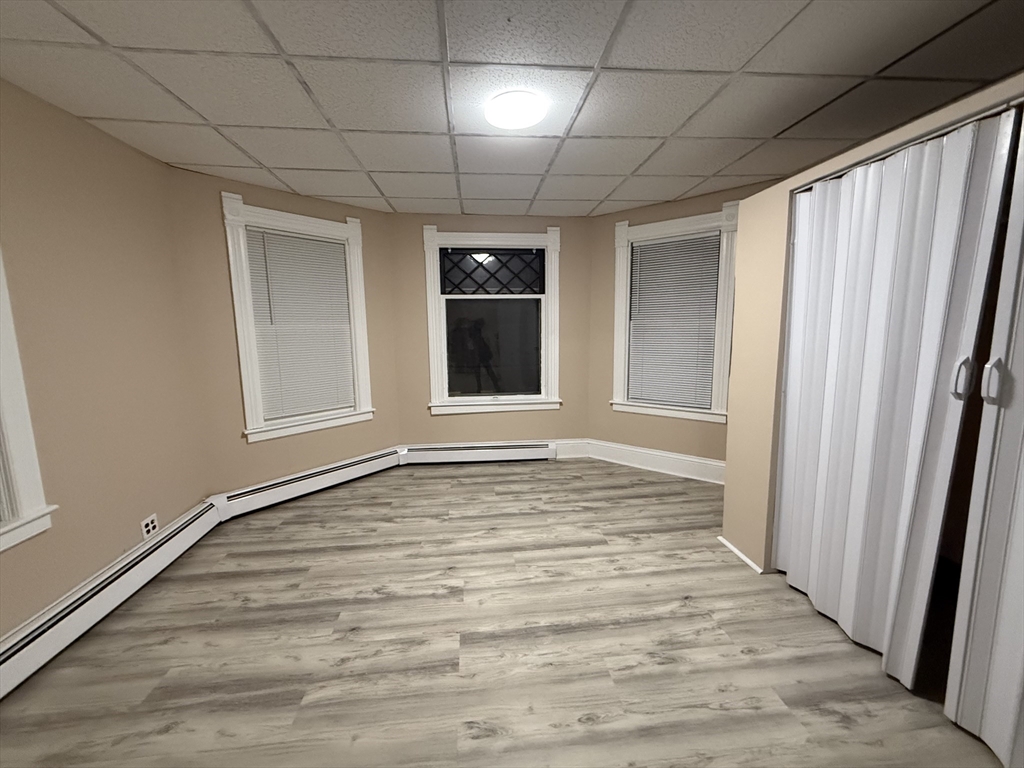 9 Winslow Street, Unit 2 Worcester, MA 01609 - Photo 5 of 10 a view of an empty room with a window