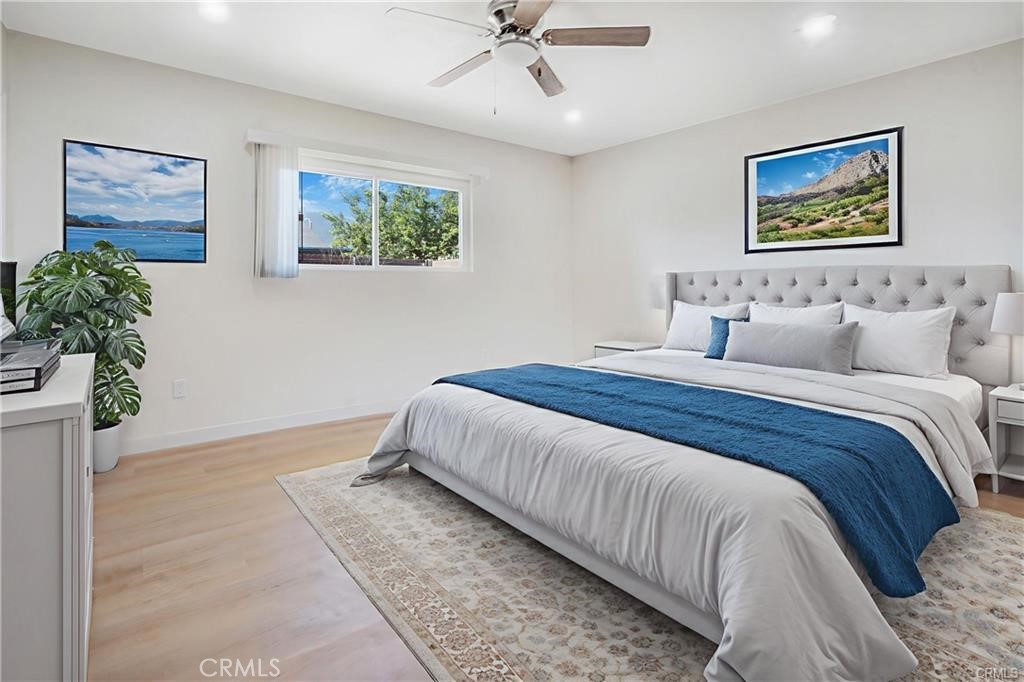 1594 Morgan Road San Bernardino, CA 92407 - Photo 11 of 31 a bedroom with bed and painting on the wall