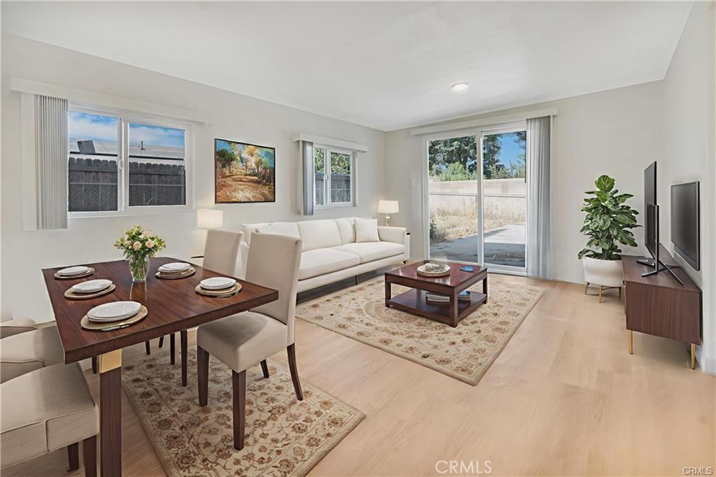 1594 Morgan Road San Bernardino, CA 92407 - Photo 21 of 31 a living room with furniture potted plant and window