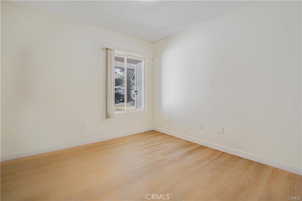 1594 Morgan Road San Bernardino, CA 92407 - Photo 5 of 31 an empty room with windows