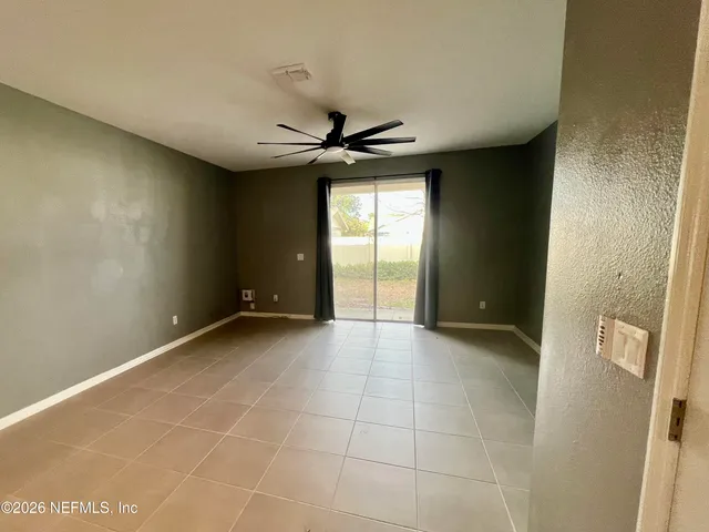 a view of an empty room and window