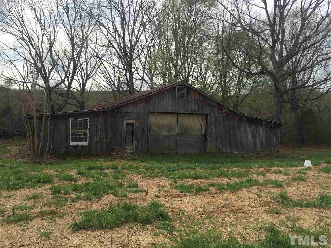 1809 Tilley Farm Road Rougemont, NC 27572 - Photo 3 of 3 a tree is standing in the yard