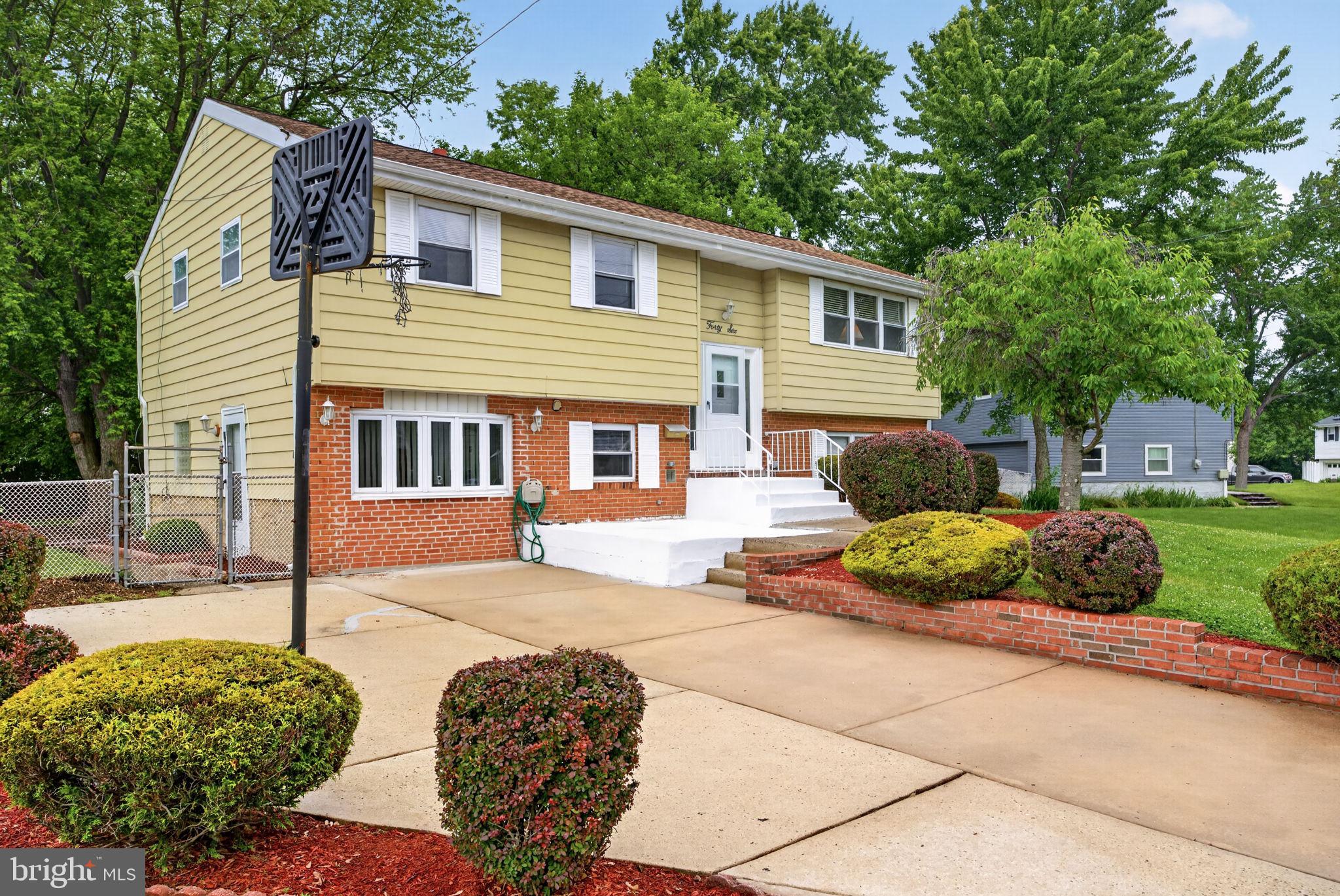 46 Trinity Avenue Marlton, NJ 08053 - Photo 2 of 37 a front view of a house with a yard