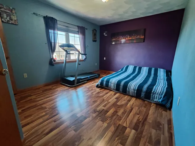 a view of a livingroom with furniture