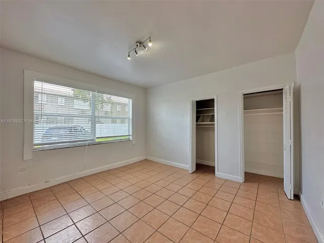 a view of an empty room with window