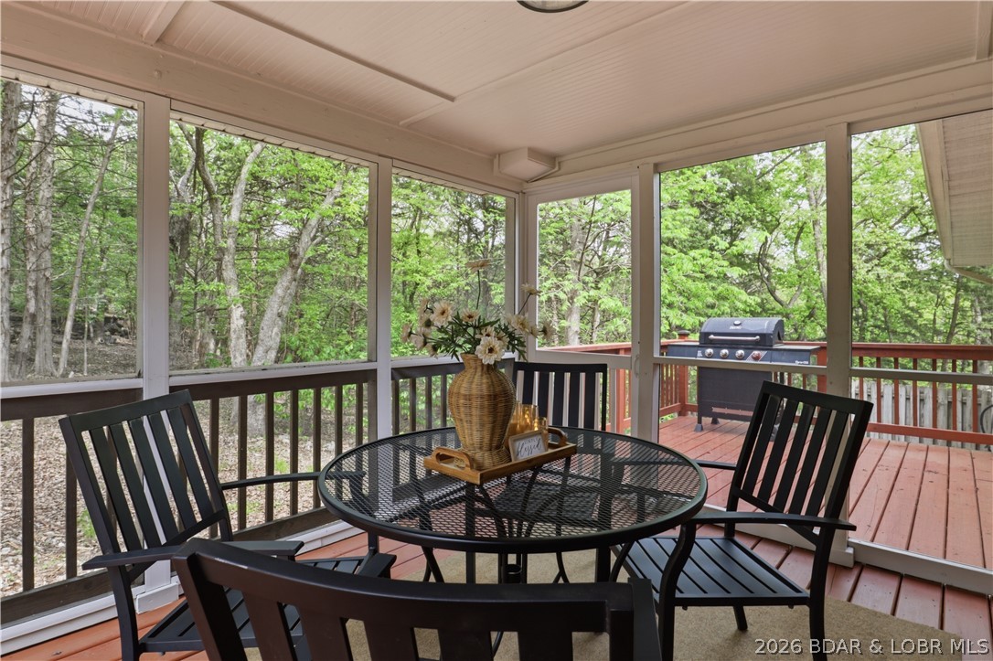 718 West Kays Point Road Lake Ozark, MO 65049 - Photo 13 of 44 Screened porch off kitchen
