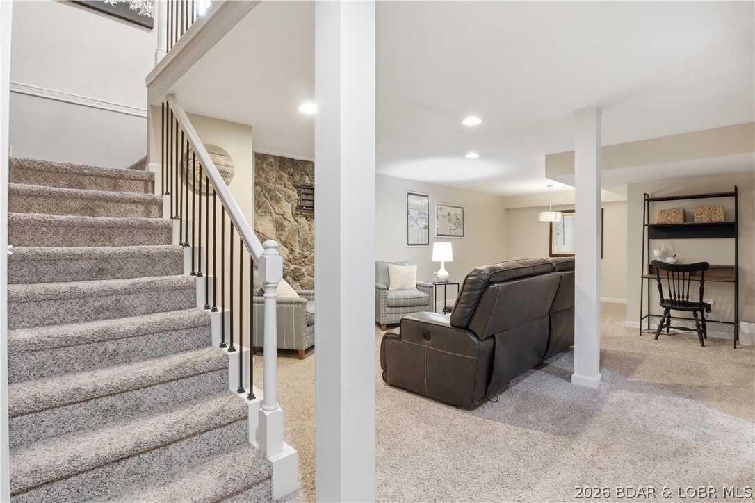 718 West Kays Point Road Lake Ozark, MO 65049 - Photo 25 of 44 Lower level living/entertaining area