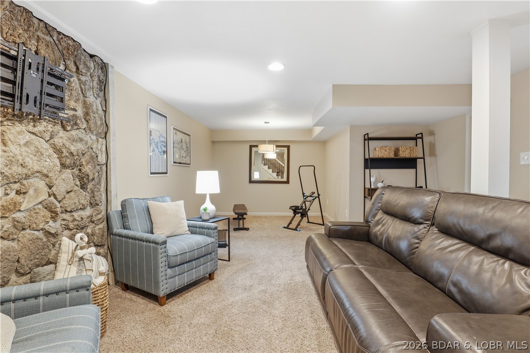 718 West Kays Point Road Lake Ozark, MO 65049 - Photo 28 of 44 Lower level living/entertaining area