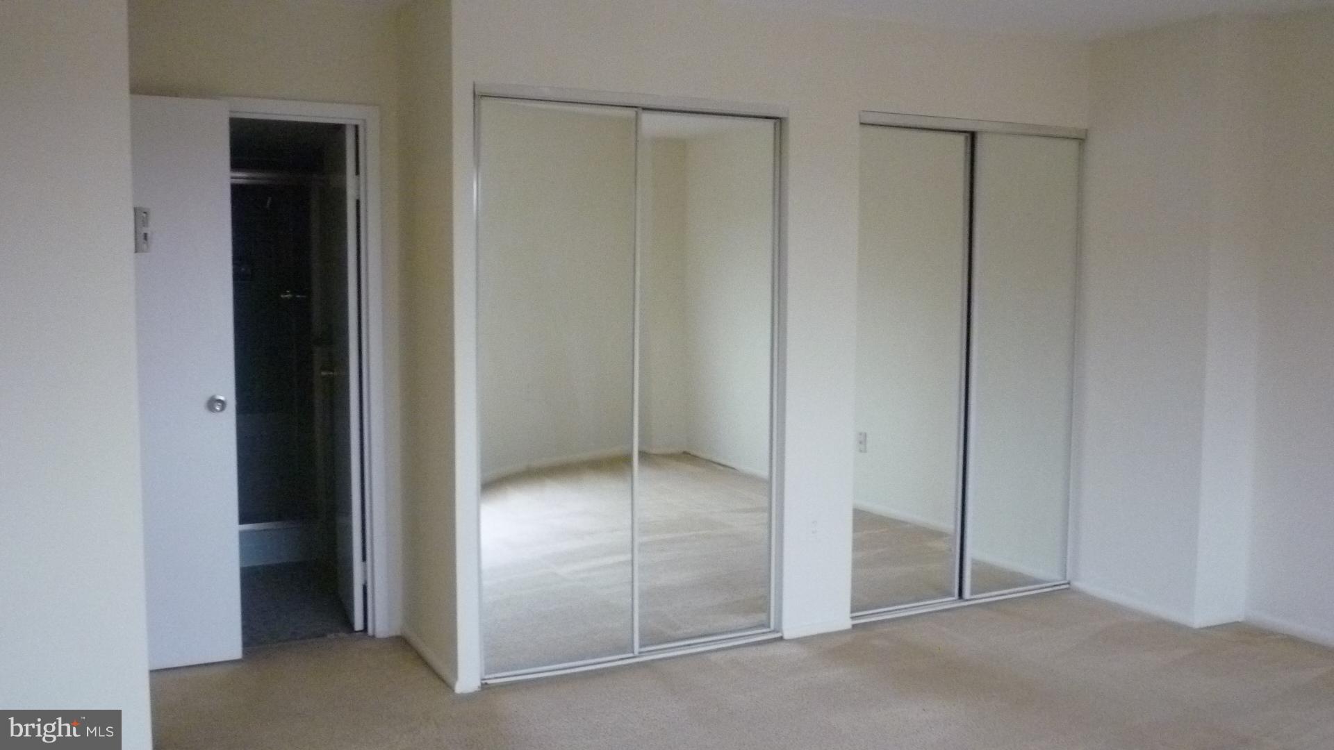 1111 University Boulevard West, Unit 1406A Silver Spring, MD 20902 - Photo 29 of 41 Master Bedroom
