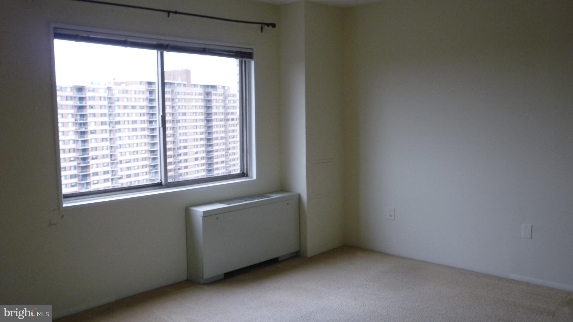 1111 University Boulevard West, Unit 1406A Silver Spring, MD 20902 - Photo 32 of 41 Master Bedroom