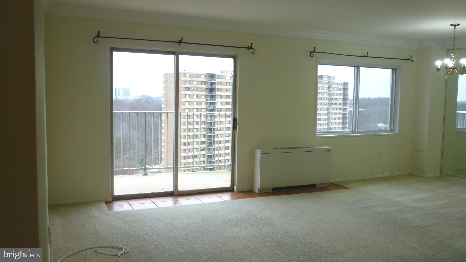 1111 University Boulevard West, Unit 1406A Silver Spring, MD 20902 - Photo 5 of 41 More or Living Room