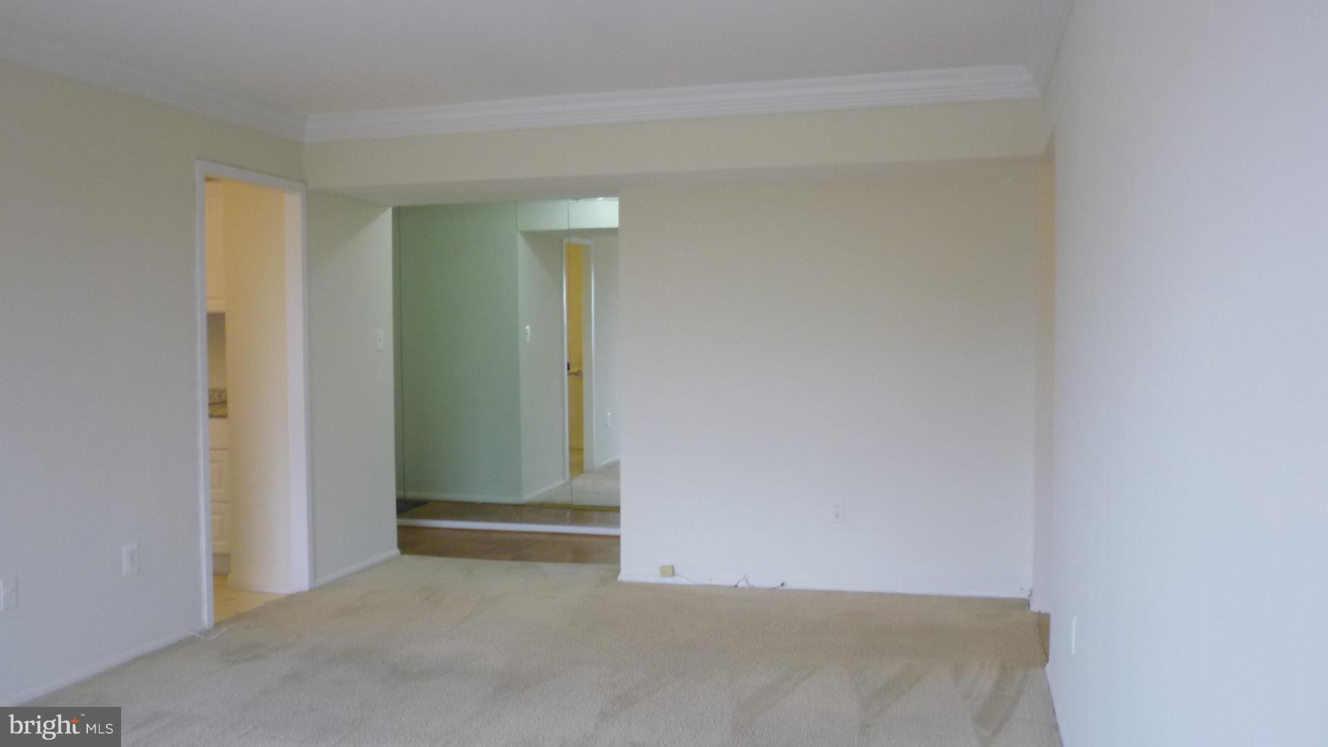 1111 University Boulevard West, Unit 1406A Silver Spring, MD 20902 - Photo 7 of 41 Other Side of Living Room