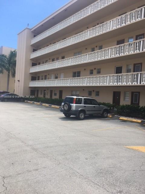 Atlantic Shores Hallandale Beach, FL 33009 - Photo 1 of 19 a car parked in front of a building