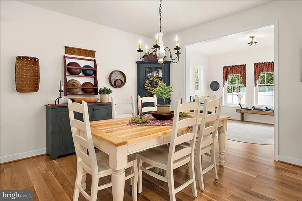 a bedroom with furniture and a book shelf