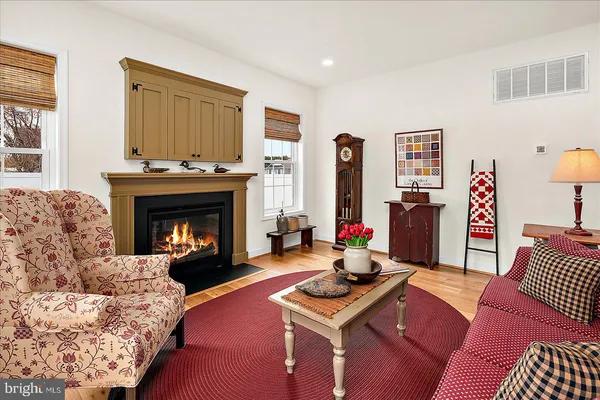 a bedroom with a bed and a dresser in it