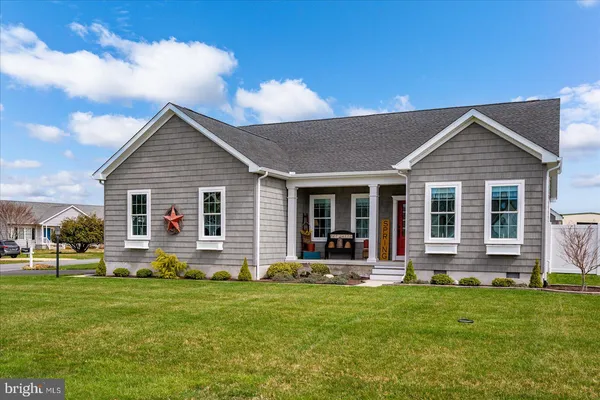 an aerial view of a house with a swimming pool