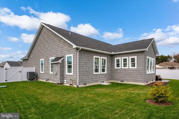 a view of a garden with sitting area