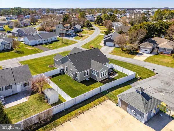 a kitchen with sink stove and cabinets