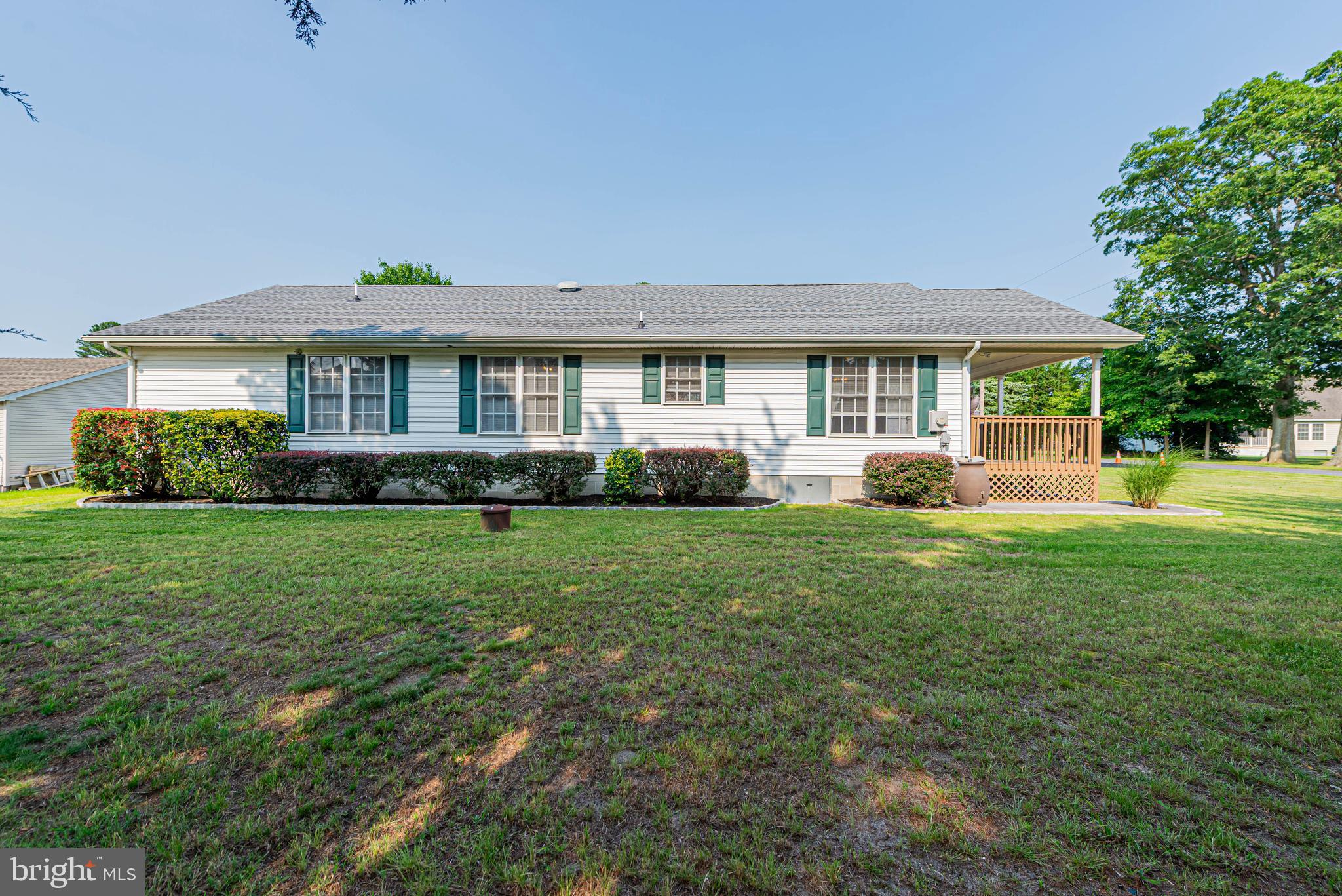 32408 Holly Ter Road Ocean View, DE 19970 - Photo 12 of 51 a view of a house with yard and garden