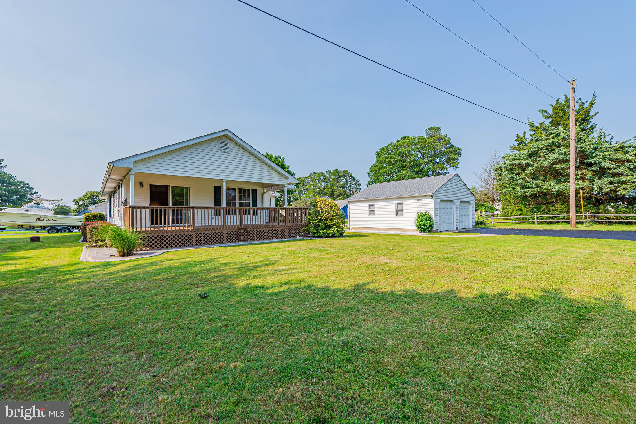 32408 Holly Ter Road Ocean View, DE 19970 - Photo 2 of 51 a front view of a house with garden