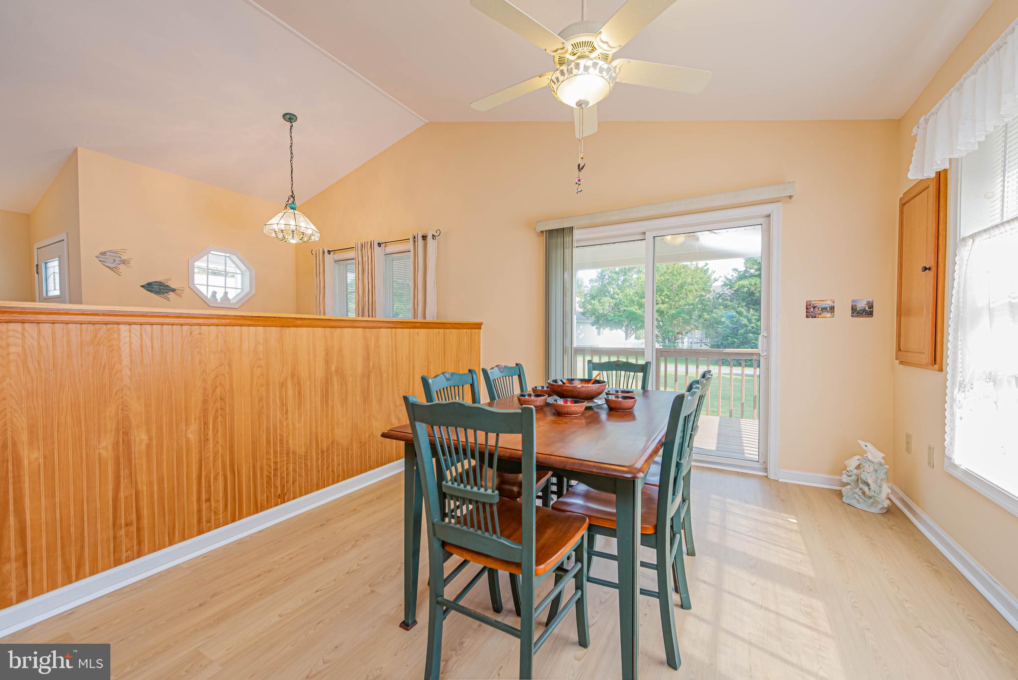 32408 Holly Ter Road Ocean View, DE 19970 - Photo 23 of 51 a view of a dining room with furniture window and outside view