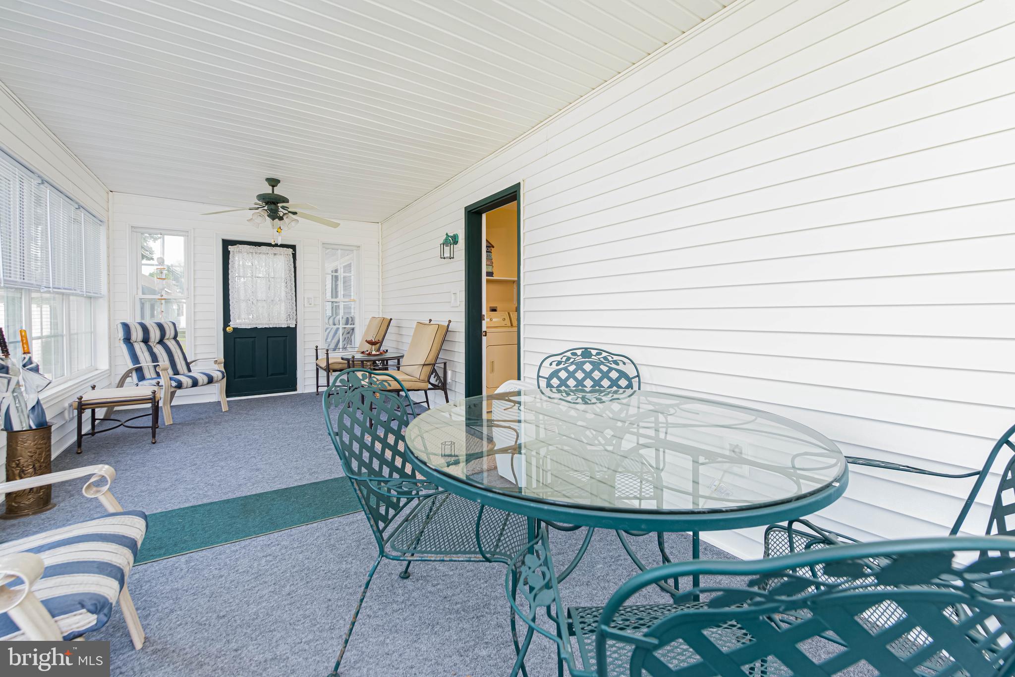 32408 Holly Ter Road Ocean View, DE 19970 - Photo 27 of 51 a view of a livingroom with furniture