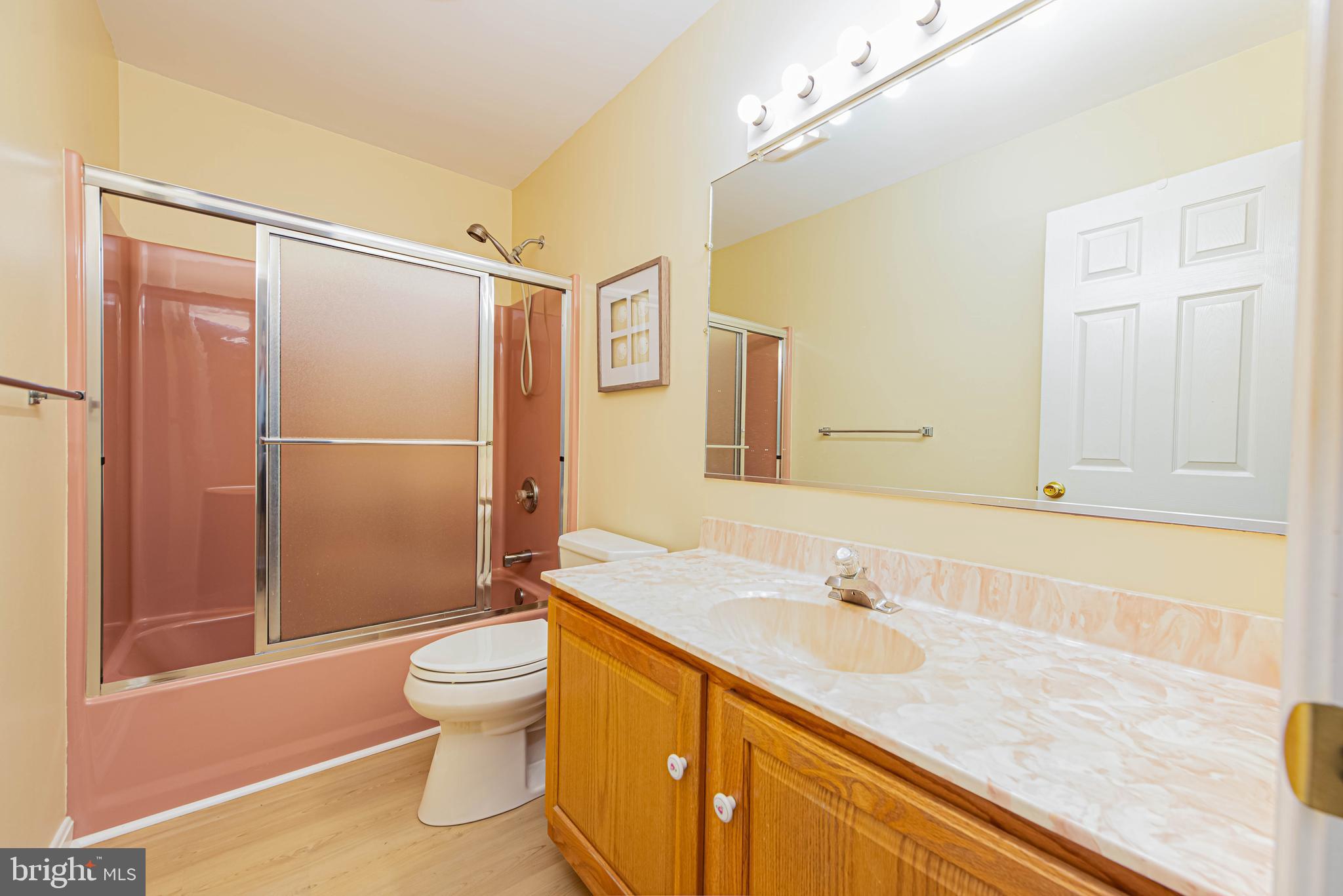 32408 Holly Ter Road Ocean View, DE 19970 - Photo 34 of 51 a spacious bathroom with a granite countertop sink toilet and shower