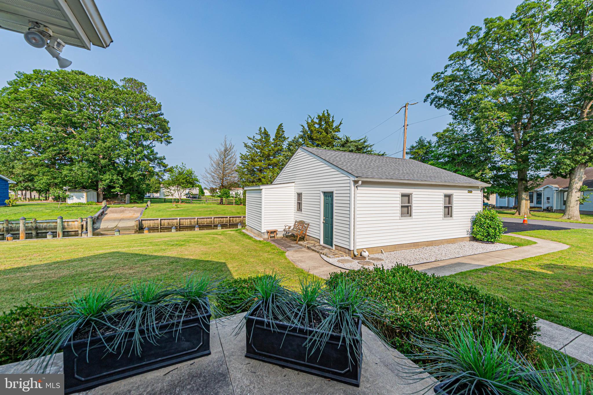 32408 Holly Ter Road Ocean View, DE 19970 - Photo 42 of 51 a view of a house with backyard and sitting area