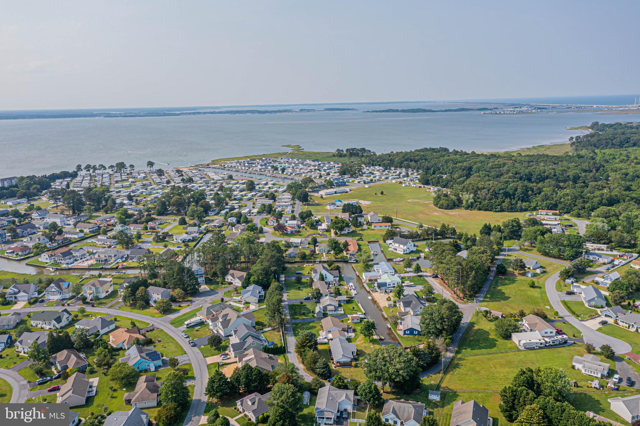 32408 Holly Ter Road Ocean View, DE 19970 - Photo 44 of 51 an aerial view of residential building and lake