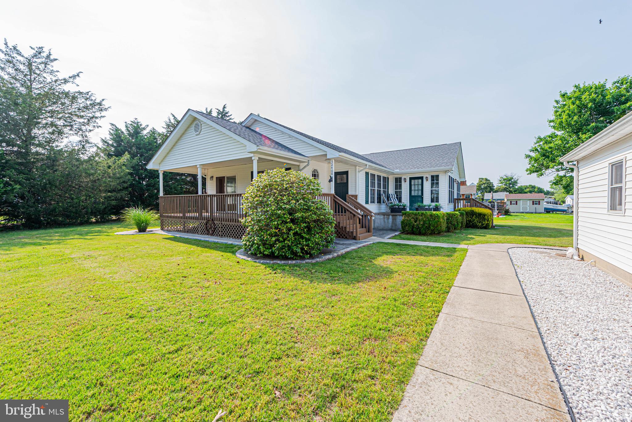 32408 Holly Ter Road Ocean View, DE 19970 - Photo 5 of 51 a front view of house with yard and green space