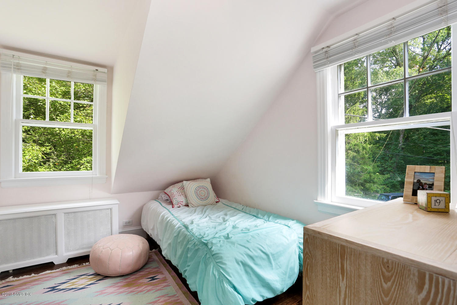167 Riverbank Road Stamford, CT 06903 - Photo 21 of 38 a bedroom with a bed and window