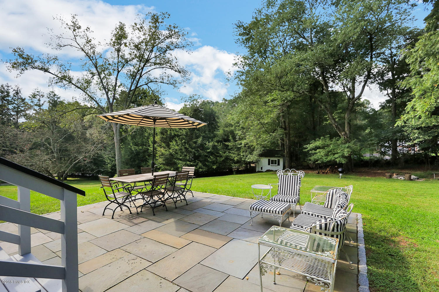 167 Riverbank Road Stamford, CT 06903 - Photo 27 of 38 a view of outdoor space yard deck and patio