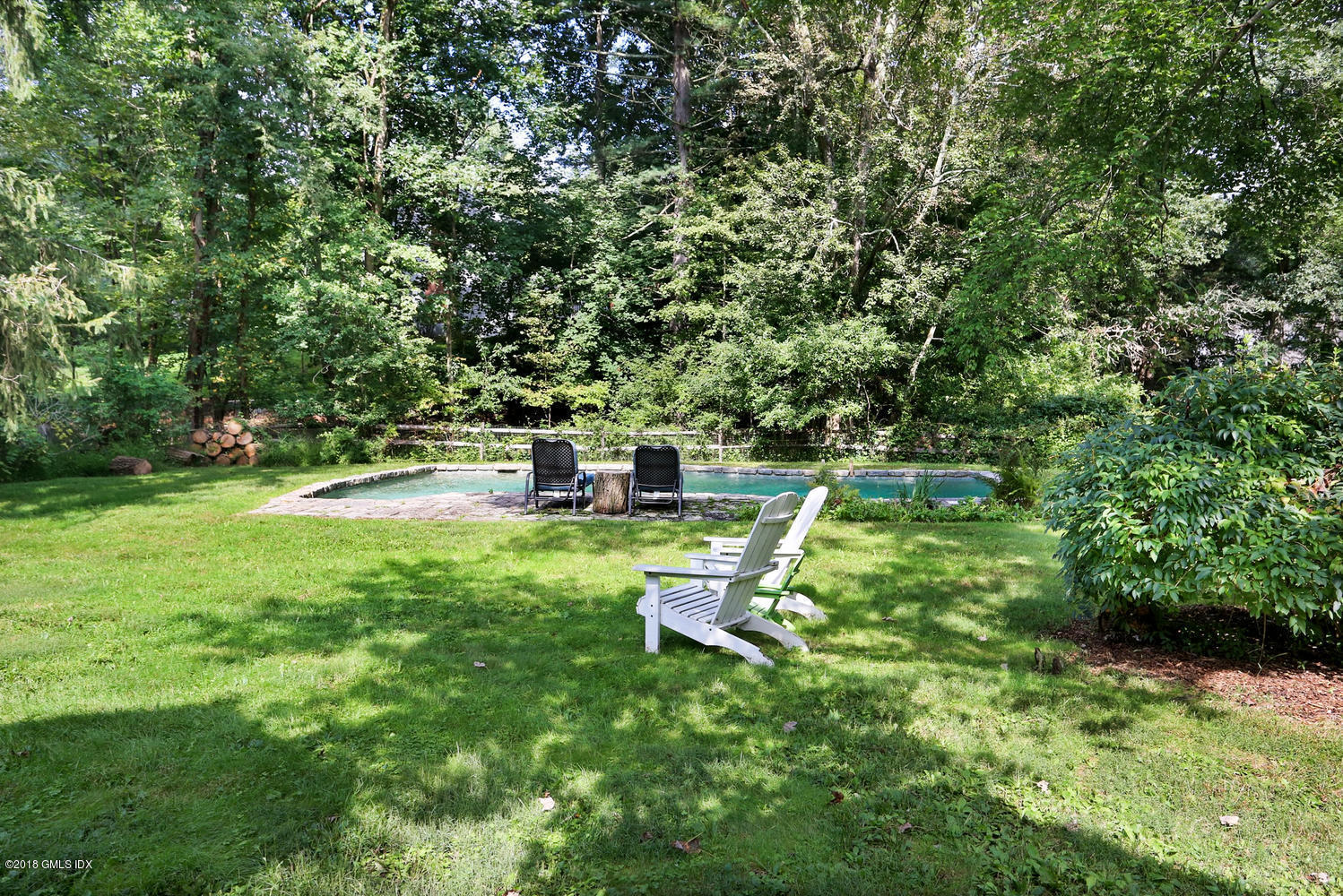 167 Riverbank Road Stamford, CT 06903 - Photo 30 of 38 a view of a park with large trees