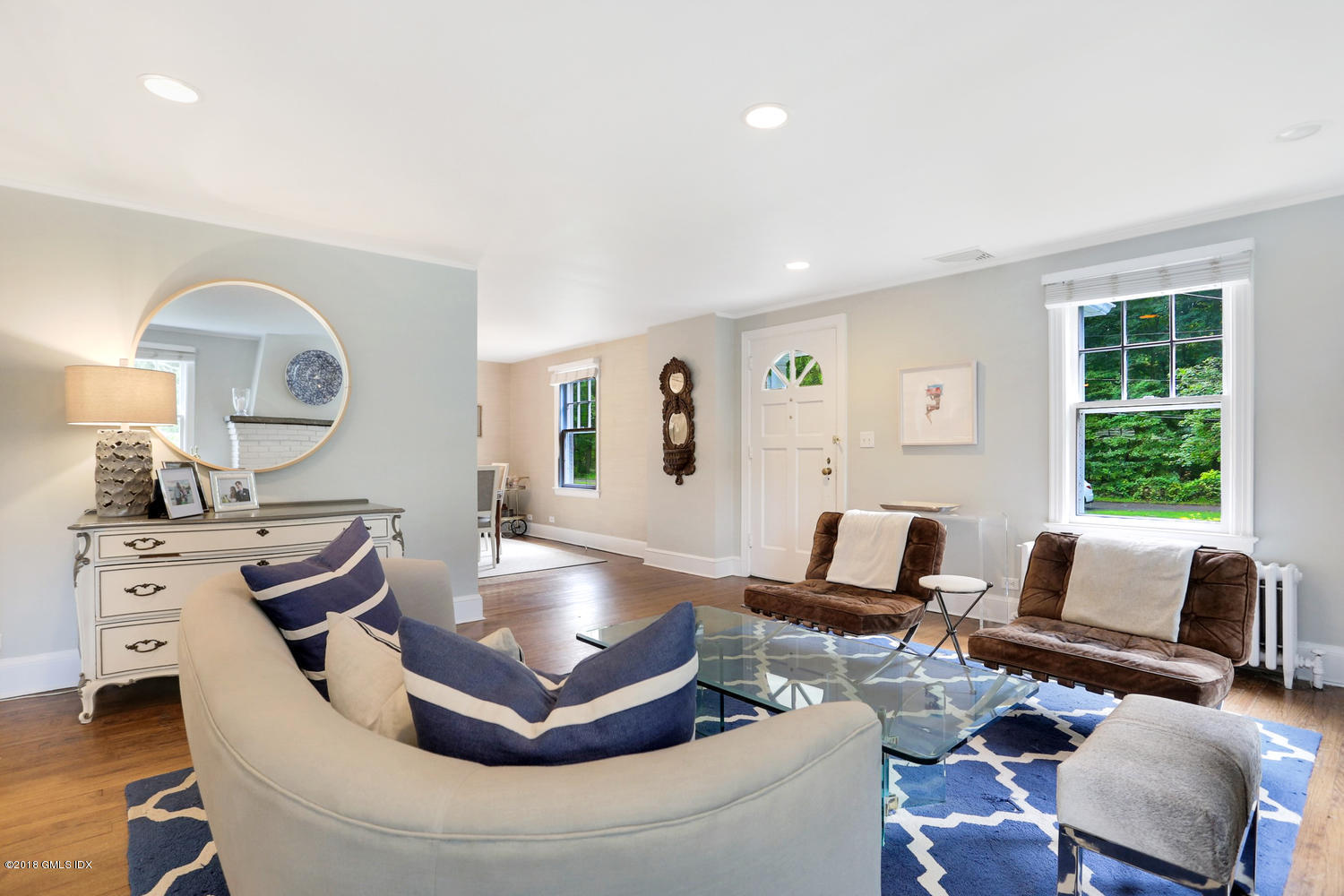167 Riverbank Road Stamford, CT 06903 - Photo 3 of 38 a living room with furniture and a large window