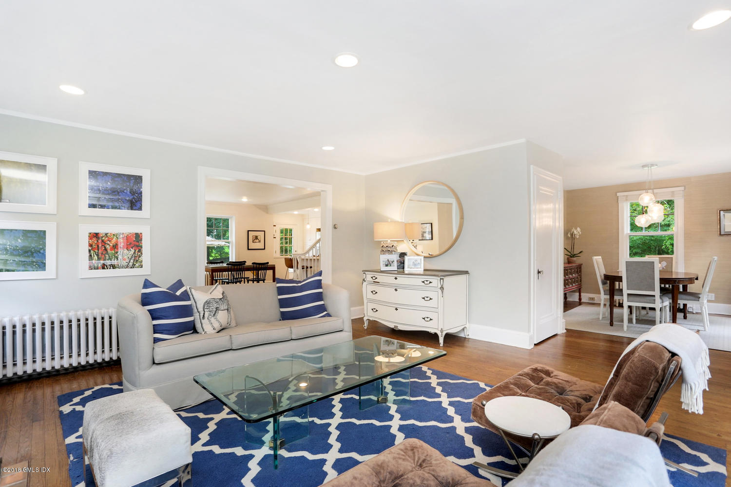 167 Riverbank Road Stamford, CT 06903 - Photo 6 of 38 a living room with furniture and wooden floor