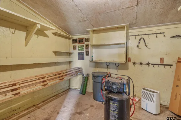 a utility room with cabinets