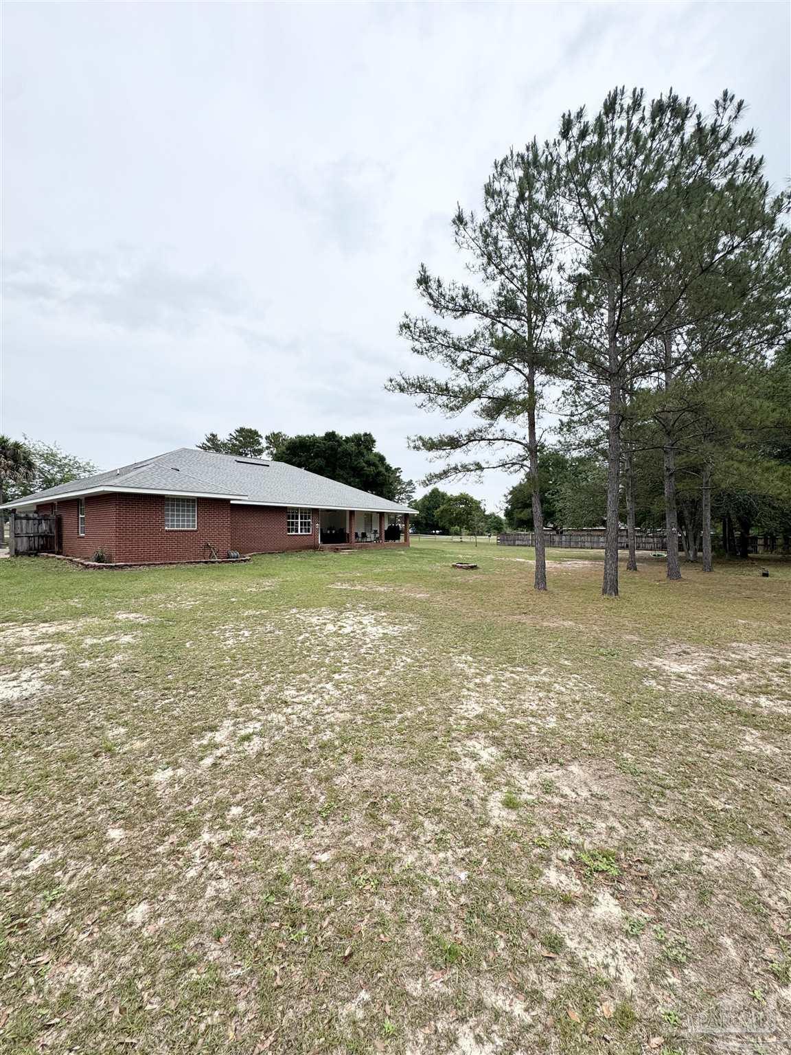 9909 South Trace Road Milton, FL 32583 - Photo 39 of 41 a view of a lake view