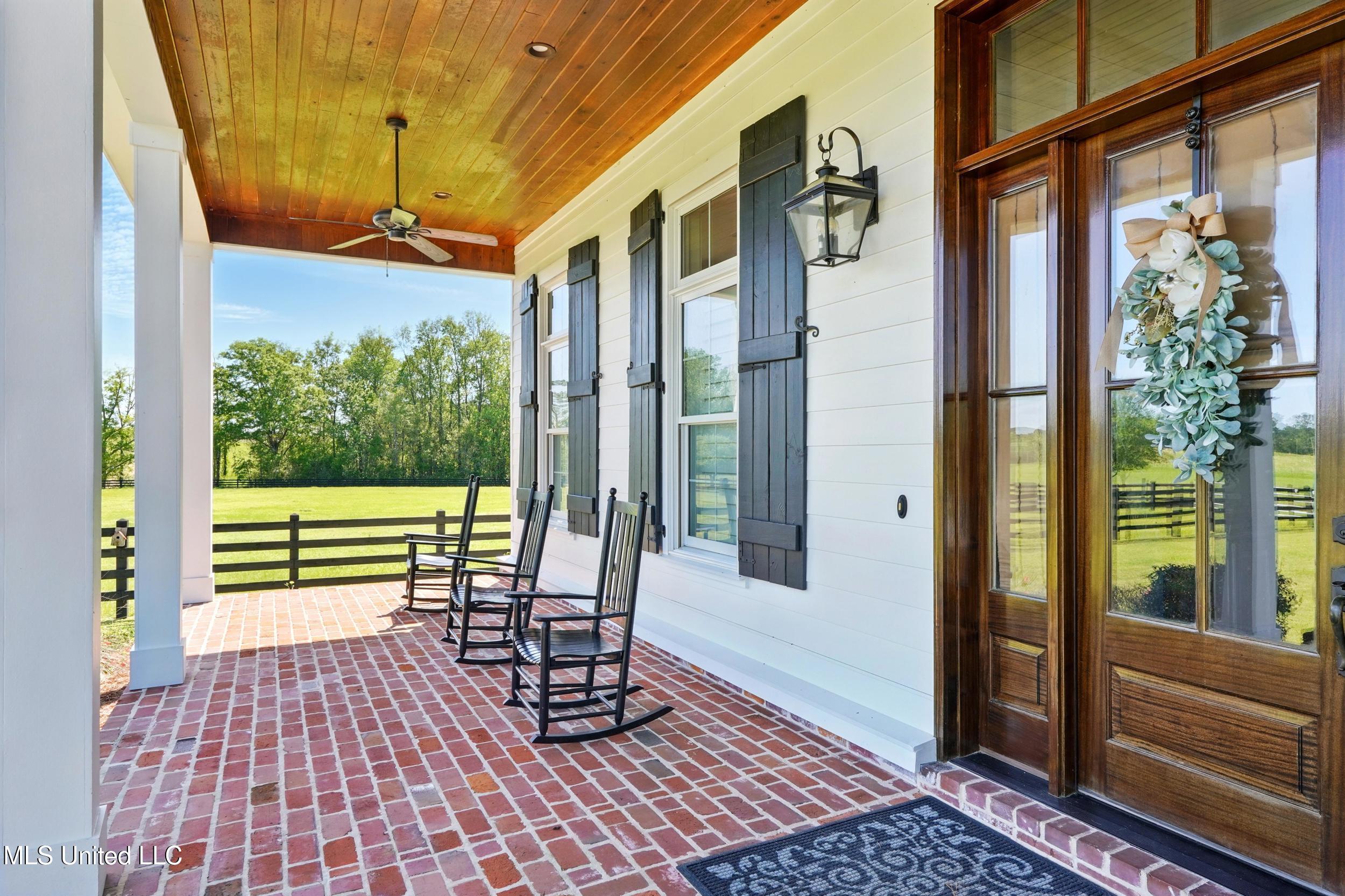110 Tyner Branch Road Wiggins, MS 39577 - Photo 12 of 83 12_house porch left