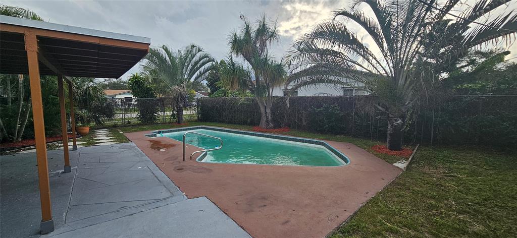 501 Northwest 65th Avenue Margate, FL 33063 - Photo 27 of 29 front view of a house with a yard